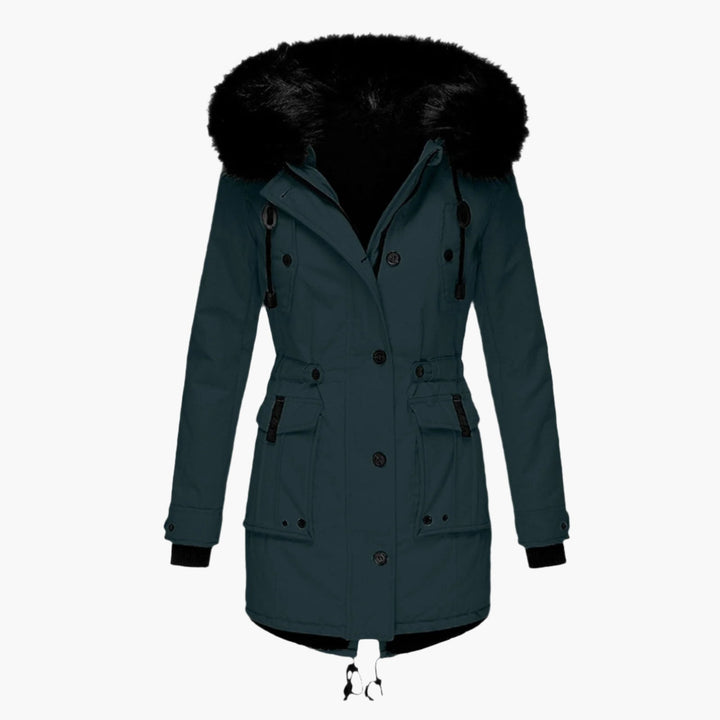 Detail of the zipper and pockets on a women's warm hooded winter coat, functional winter jacket.