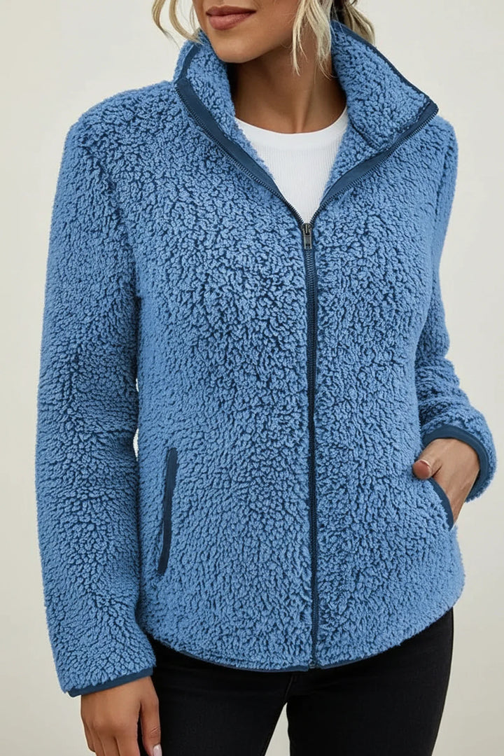 Stylish women's warm winter jacket, cozy zip-up outerwear with stand collar for cold weather.