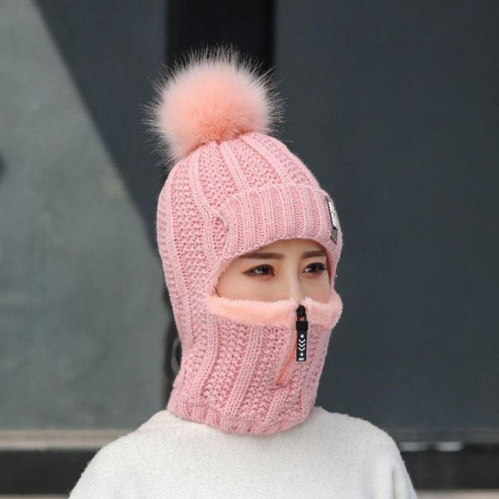 Stack of colorful women's warm winter windproof hats, displaying variety and fashion