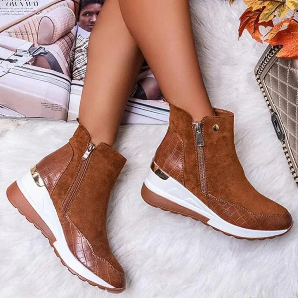 Women's waterproof ankle boots with dual zippers for easy on/off. Comfortable & stylish for winter rain.