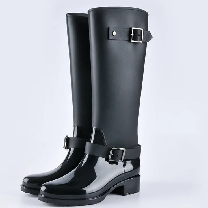 Durable women's knee-high waterproof boots with chic buckles, block heels, perfect for rain & snow.