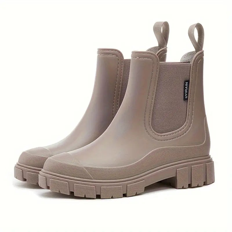 Stylish women's black Chelsea boots, waterproof and slip-on design, ideal for winter wear