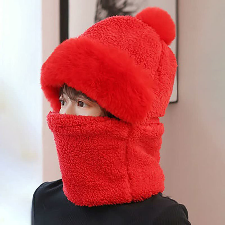 Front view of a women's winter fleece beanie, paired with a matching scarf