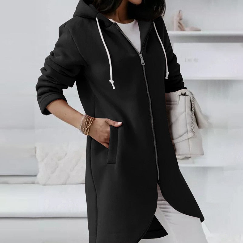 Comfortable women's vest with an adjustable hood and secure zip, a practical and fashionable layering piece.