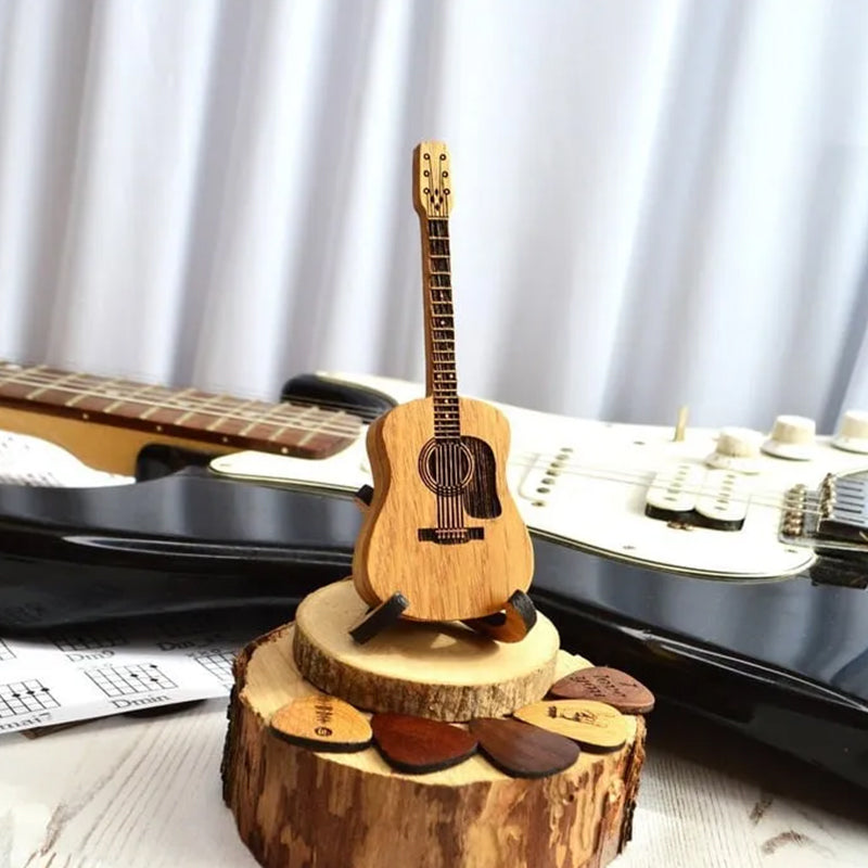 Acoustic guitar pick storage box, engraved wood with sleek design.