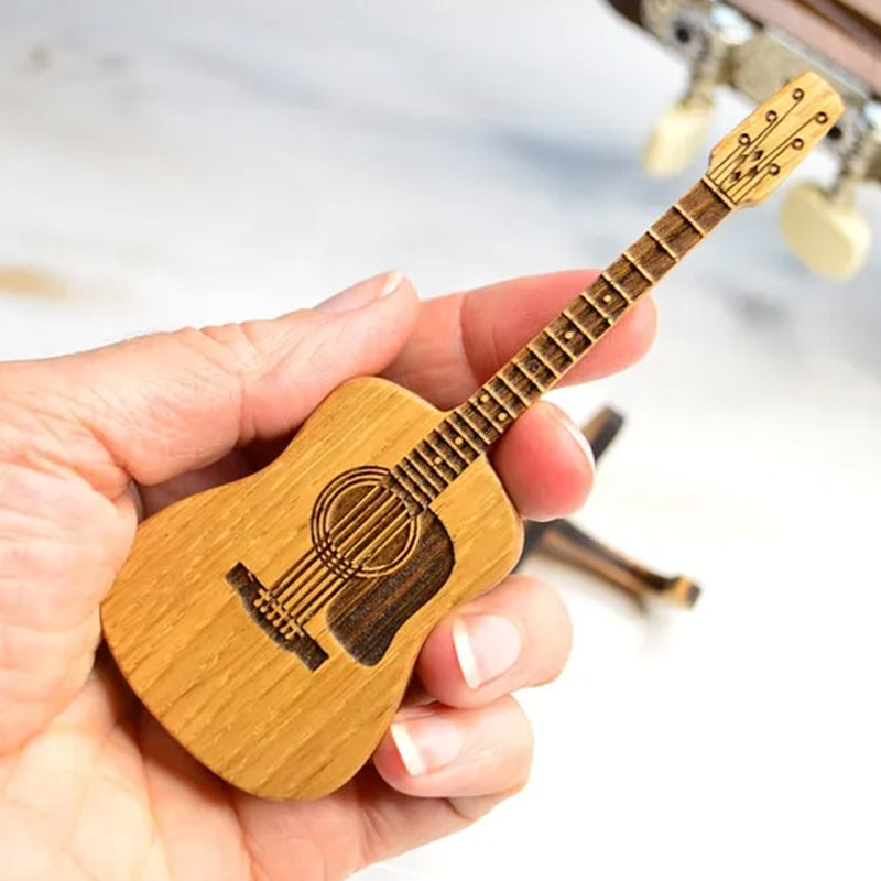 Guitar pick display stand and holder, natural wood finish, music accessory.