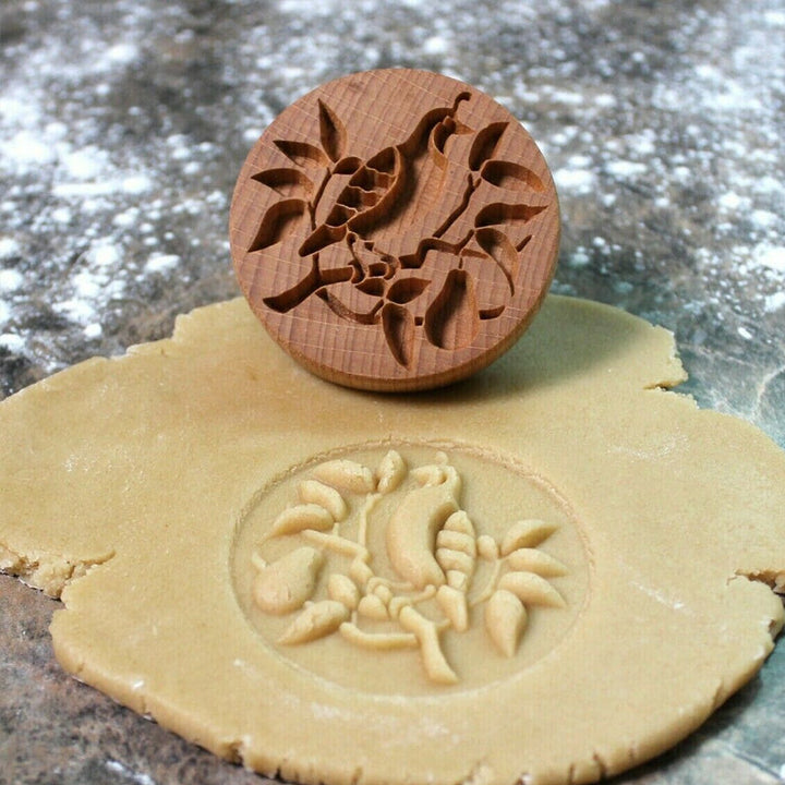 Detailed wooden embossing stamp, great for cookie decorating and crafting activities